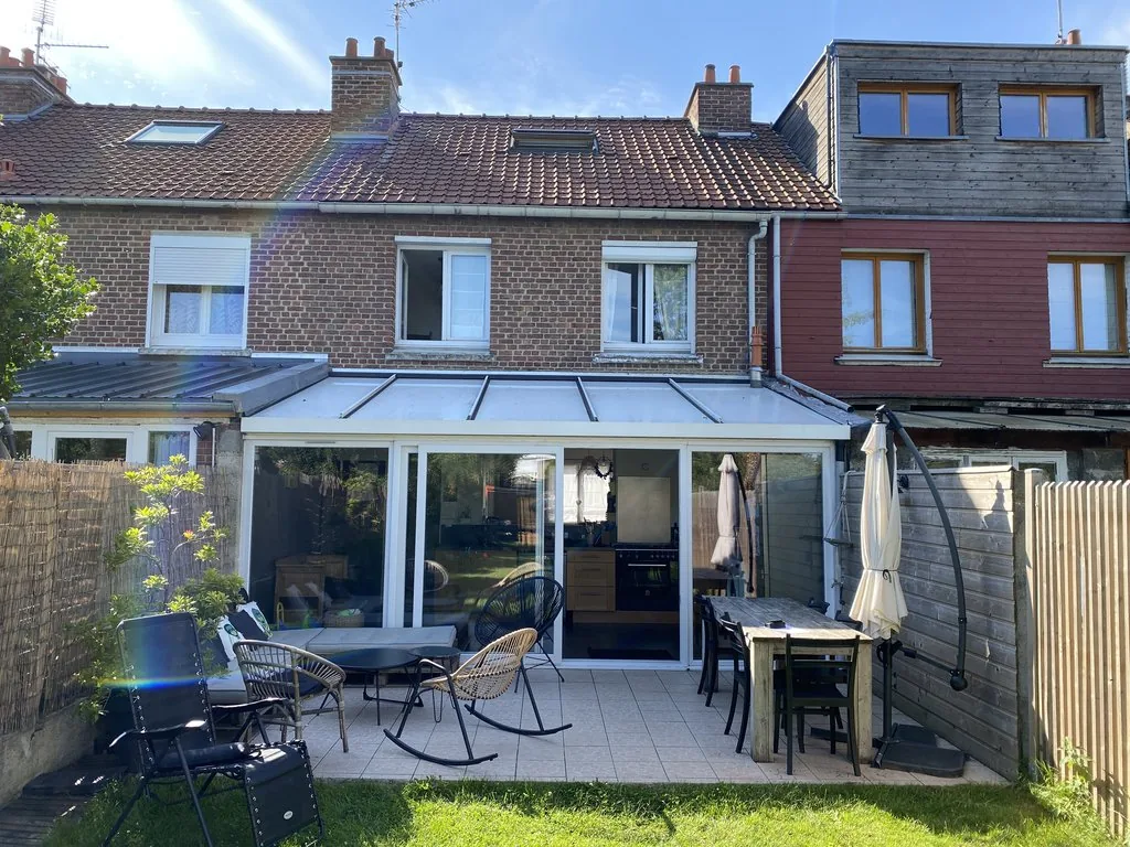 Extension d'une maison à Marcq-en-Barœul - avant, l'ancienne véranda côté jardin