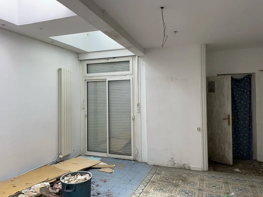 Rénovation clé en main d'une maison de 1908 à La Madeleine - avant, la pièce sous la verrière